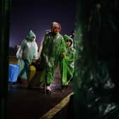 A family of Ukrainian refugees crosses the border point from Ukraine into Medyka, Poland