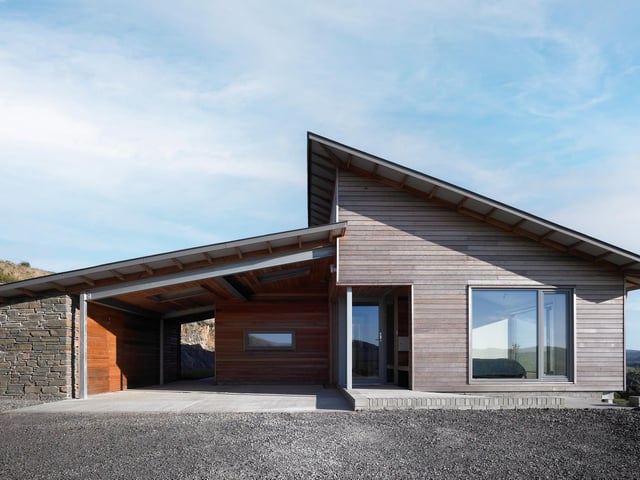 Exterior: The house sits at the end of a private driveway off a quiet country lane and offers ample parking. Decked terraces around the home are terrific for admiring bucolic vistas.