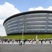 New video footage shows large queues outside the SSE Hydro arena in Glasgow, where thousands of residents are waiting to receive their vaccinations.