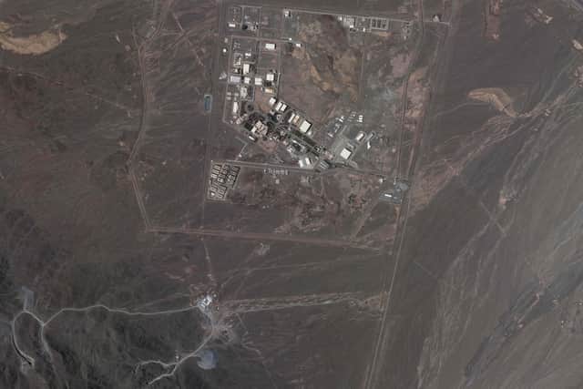 This satellite image from Planet Labs PBC shows Iran's underground Natanz nuclear site, as well as ongoing construction to expand the facility in a nearby mountain to the south, near Natanz, Iran, May 9, 2022.