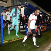 Aberdeen captain Anthony Stewart leads out his team for their match against Darvel.