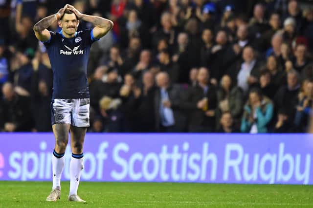 Scotland's fly-half Blair Kinghorn reacts after missing a late penalty in the defeat by Australia.