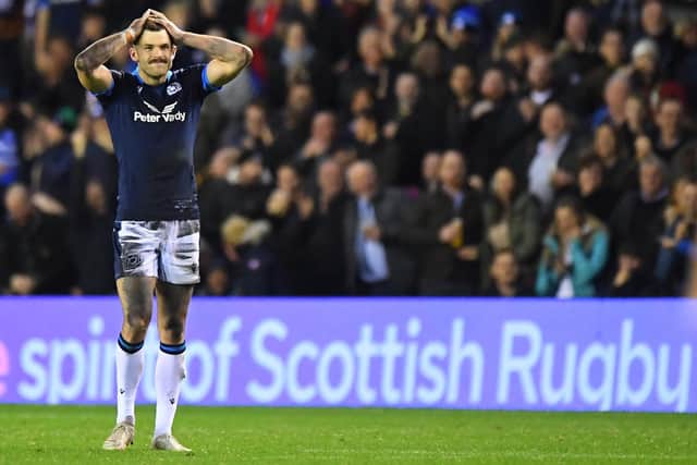 Scotland's fly-half Blair Kinghorn reacts after missing a late penalty in the defeat by Australia.