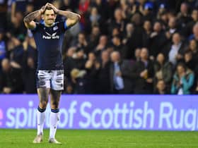 Scotland's fly-half Blair Kinghorn reacts after missing a late penalty in the defeat by Australia.