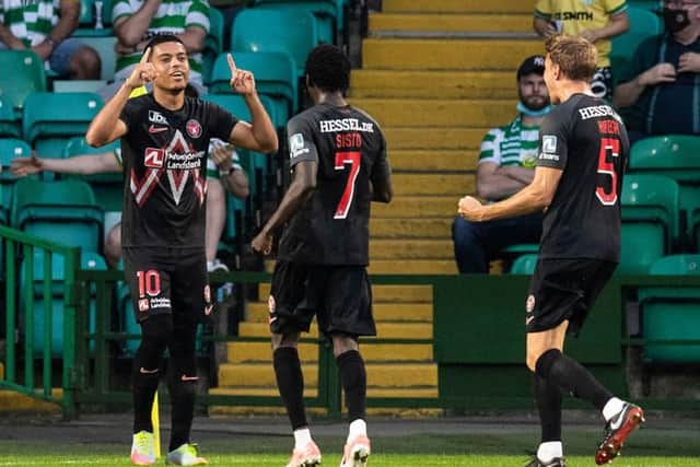 FC Midtjylland's Evander (left) celebrates his equaliser during a Champions League qualifier between Celtic and FC Midtjylland at Celtic Park on July 20, 2021, in Glasgow, Scotland (Photo by Ross Parker / SNS Group)