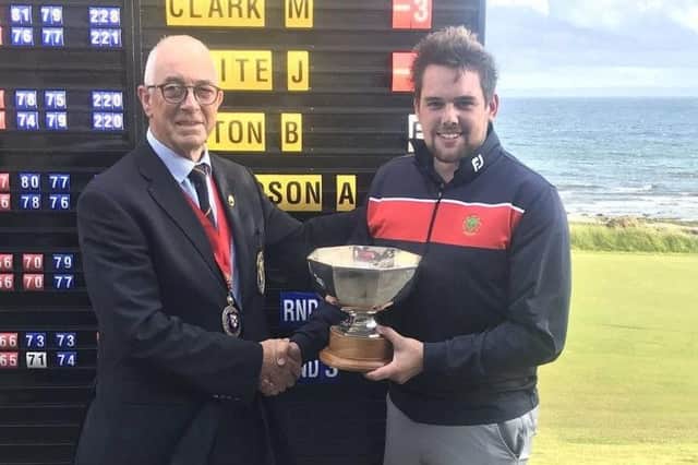 Stuart McLaren, who has since turned professional, receives the East of Scotland Open Trophy after his win at Lundin in 2019.