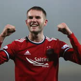 Aberdeen midfielder Teddy Jenks celebrates at full-time after hitting a contentious winner v St Johnstone  (Photo by Craig Williamson / SNS Group)