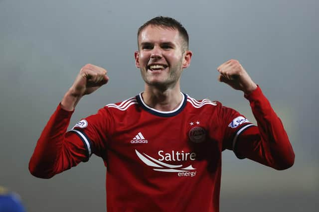 Aberdeen midfielder Teddy Jenks celebrates at full-time after hitting a contentious winner v St Johnstone  (Photo by Craig Williamson / SNS Group)