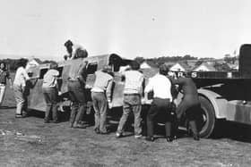 The recovery of the Spartan from the hillside in 1973. Only the front fuselage remains with the rest of the plane, which was largely constructed from wood, rotting away over time. PIC :NMS Trustees.