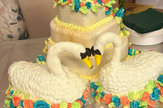 Residents William (better known as Bill) and Jean Marshall at HC-One Scotland’s Douglas View Care Home’s 73rd Wedding Anniversary cake made by Head Chef, Robert Little