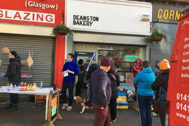 Deanston Bakery in Shawlands, Glasgow, put up the saltire and Ukrainian flags during its bake sale with 100% of profits going to Ukrainian charities.