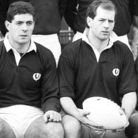 Gary Callander, flanked by Gavin Hastings (left) and Roy Laidlaw (right), before the Wales v Scotland match in February 1988