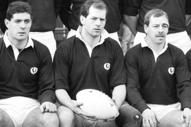 Gary Callander, flanked by Gavin Hastings (left) and Roy Laidlaw (right), before the Wales v Scotland match in February 1988