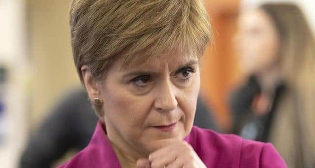 Nicola Sturgeon will "pay attention" to UK decision on 2m rule