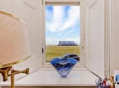The flat has views over arguably the most famous hole in world golf.