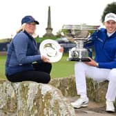 Susan and Matthew Fitzpatrick pose with their trophies on the Swilcan Bridge at St Andrews after winning the team event in the Alfred Dunhill Links Championship. Picture: Octavio Passos/Getty Images.