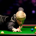 Australia's defending champion Neil Robertson is already out of this year's Masters Snooker after being knocked out in the first round.
