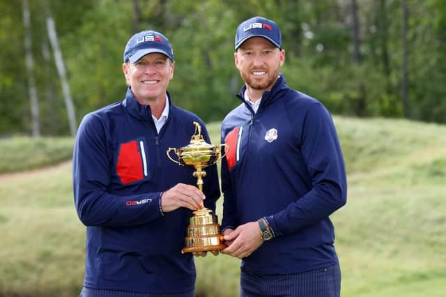 US captain Steve Stricker and Daniel Berger pose with the trophy prior to the 43rd Ryder Cup at Whistling Straits. Picture: Andrew Redington/Getty Images.