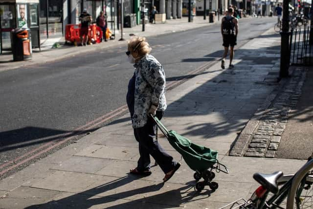 An elderly woman wearing a face mask (Photo: Dan Kitwood/Getty Images)