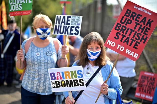 Protesters hold a rally calling for Scottish independence and nuclear disarmament outside HM Naval Base Clyde at Faslane (Picture: Jeff J Mitchell/Getty Images)