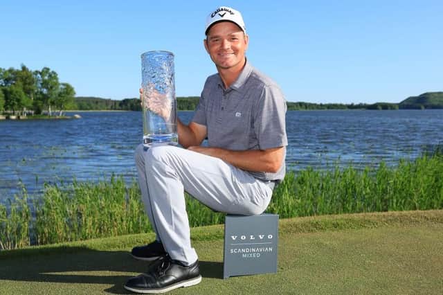 Dale Whitnell poses with the trophy after winning of the Volvo Car Scandinavian Mixed at Ullna Golf & Country Club in Sweden. Picture: Matthew Lewis/Getty Images.