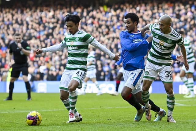Rangers' Malik Tillman (centre) and Celtic's Reo Hatate and Daizen Maeda battle for possession. (Photo by Rob Casey / SNS Group)
