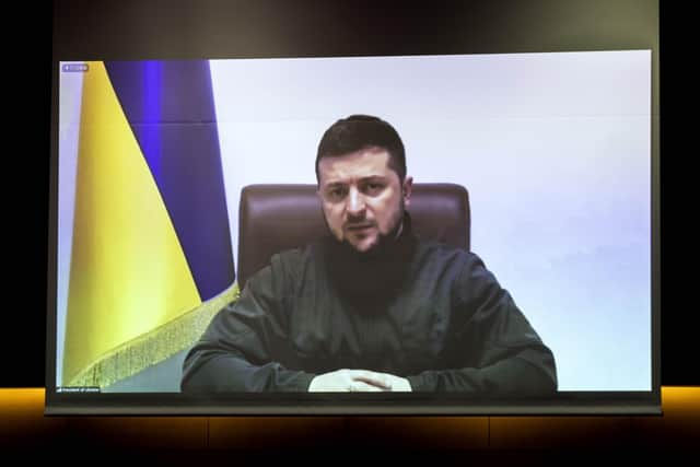 Ukrainian President Volodymyr Zelensky has called on people around the world to come "to your squares, your streets" to stand with Ukraine and against the war on Thursday. Photo by Behrouz Mehri - Getty Images