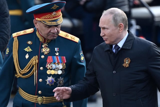 Russian President Vladimir Putin and Defence Minister Sergei Shoigu. Photo by Kirill Kudryavtsev Getty Images)