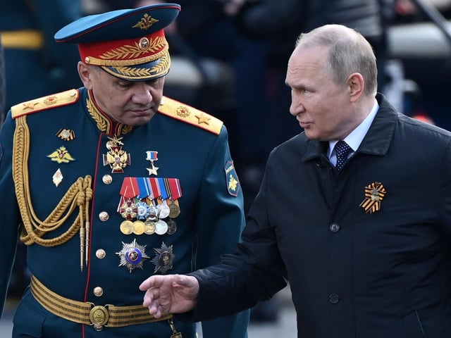Russian President Vladimir Putin and Defence Minister Sergei Shoigu. Photo by Kirill Kudryavtsev Getty Images)