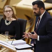 Humza Yousaf reacts as he answers questions during First Minister's Questions at the Scottish Parliament. Picture: Jeff J Mitchell/Getty Images