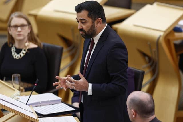 Humza Yousaf reacts as he answers questions during First Minister's Questions at the Scottish Parliament. Picture: Jeff J Mitchell/Getty Images