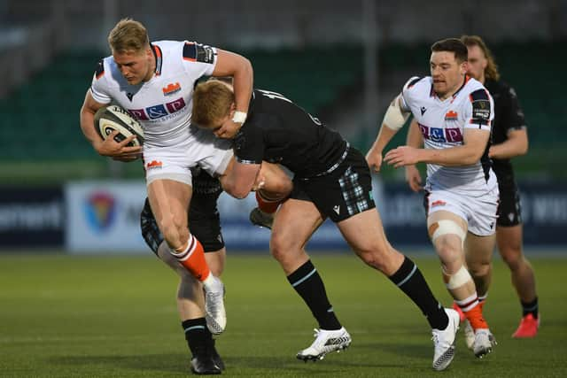 Edinburgh winger Duhan van der Merwe is stopped in his tracks. Picture: Ross MacDonald / SNS