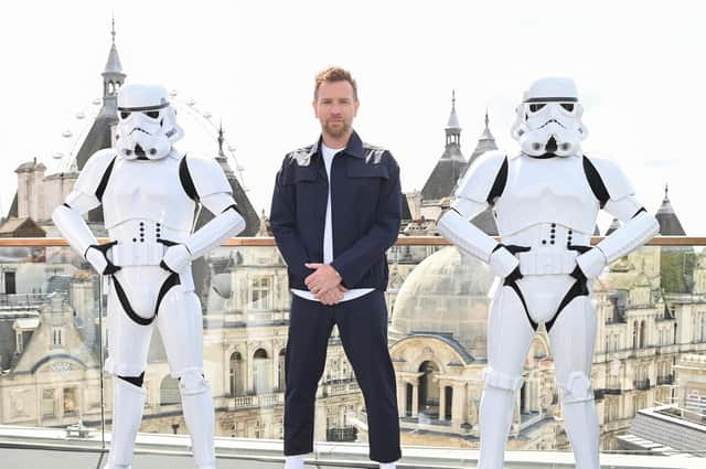 Ewan McGregor poses with Stormtroopers as he attends an "Obi-Wan Kenobi" photocall at the Corinthia Hotel in London. Picture Kate Green/Getty Images