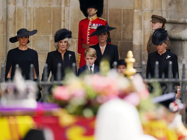 The Duchess of Sussex, the Queen Consort, Prince George, the Princess of Wales, Princess Charlotte and Princess Charlotte after State Funeral of Queen Elizabeth II, held at Westminster Abbey, London. Picture date: Monday September 19, 2022.