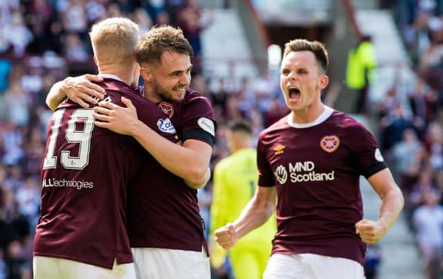 Hearts got their cinch Premiership campaign up and running with a 2-1 win over Ross County.