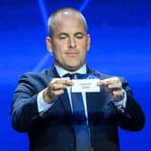 English former football player Joe Cole shows the paper slip of Celtic FC during the draw for the 2023/2024 UEFA Champions League at The Grimaldi Forum in the Principality of Monaco.