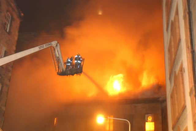 Firefighters tackle the blaze in Edinburgh's Cowgate   Pic: Tony Marsh