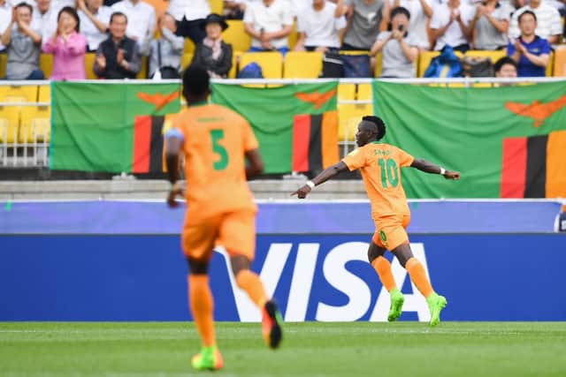 Fashion Sakala celebrates after scoring for his country in 2017. The Rangers striker hopes to be involved in Zambia's World Cup qualifier in Equatorial Guinea next month. (Photo by JUNG YEON-JE/AFP via Getty Images)