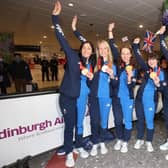 Great Britain curling Gold medalists Eve Muirhead, Vicky Wright, Jennifer Dodds, Hailey Duff and Mili Smith arrive at Edinburgh Airport. (Photo credit: Steve Welsh/PA Wire).