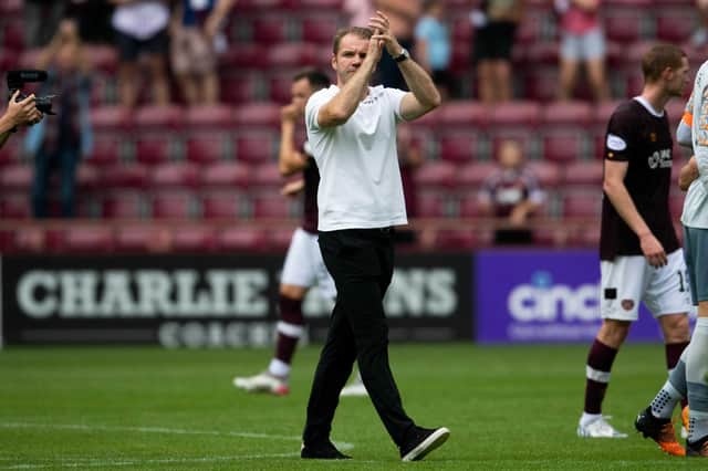 Hearts manager Robbie Neilson applauds fans at full-time against Dundee United.