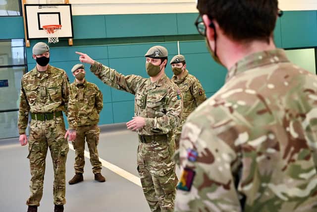 Members of the Royal Scots Dragoon Guard set up a Covid vaccination centre in Glasgow in January. Photo by Jeff J Mitchell/Getty Images.