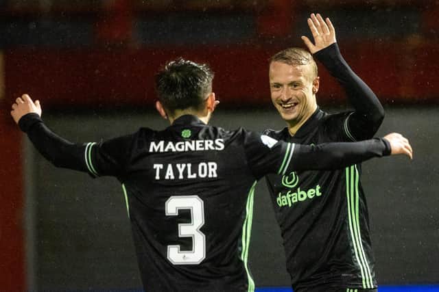 Celtic's Leigh Griffiths celebrates with Greg Taylor after scoring to make it 2-0 in Hamilton. (Photo by Craig Williamson / SNS Group)