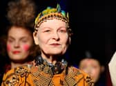 Vivienne Westwood walks the runway during her show at Paris Fashion Week in 2014 in Paris