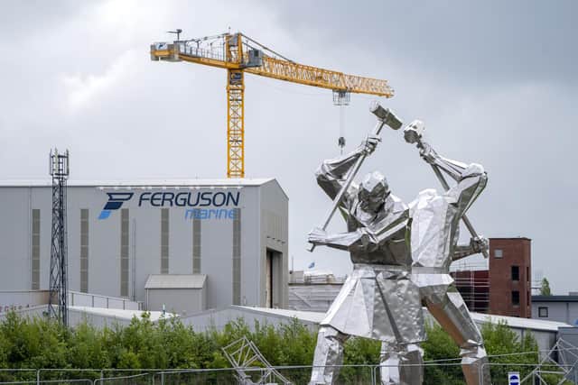 The 'Shipbuilders of Port Glasgow' sculpture alongside the Ferguson Marine shipyard (Picture: Jane Barlow/PA)
