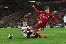 Former Celtic youngster Ben Doak in action on his Liverpool debut during the Carabao Cup win over Derby County at Anfield. (Photo by John Powell/Liverpool FC via Getty Images)
