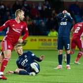 Niall McGinn celebrates pulling a goal back to making it 2-1. Picture: SNS