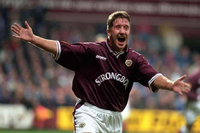 Hearts striker John Robertson celebrates after scoring against Rangers in 1997.