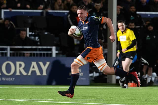 Glen Young breaks clear before his second try of the match for Edinburgh.