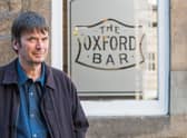 Edinburgh-based crime writer Ian Rankin outside the Oxford Bar.