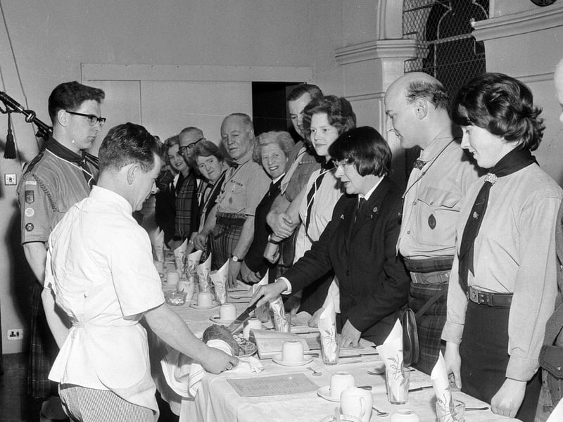 Cutting the haggis at the Edinburgh and Leith Rover Scouts and Rangers Burns Supper in 1964.
